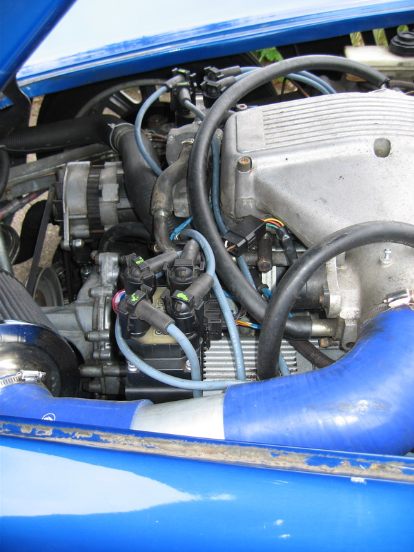 Coil pack brackets mounted on the rocker covers